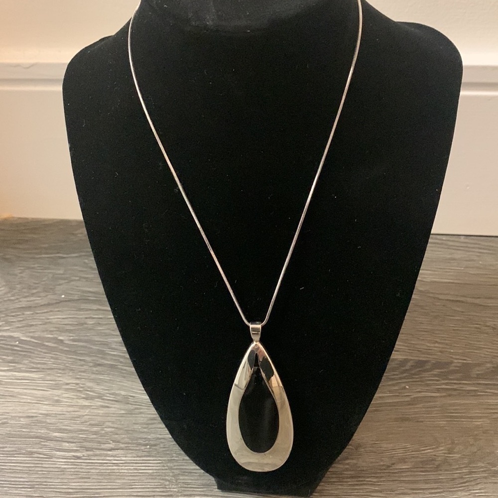 Silver tear drop necklace black inset 16” chain NSD marking on back 1.3oz